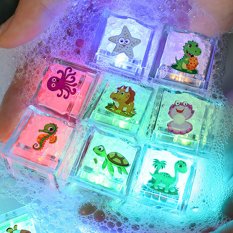 Glaçons lumineux LED multicolores plongés dans un cocktail